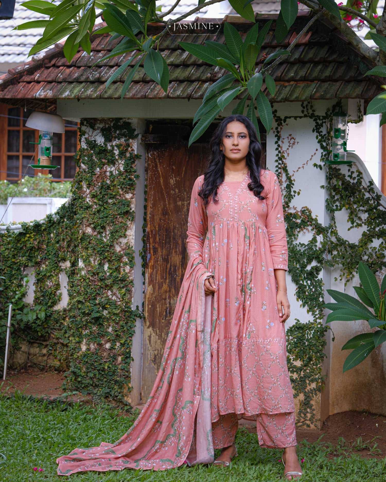 In-house printed Jasmine prints on coral shaded pleated kurta set in viscose voile