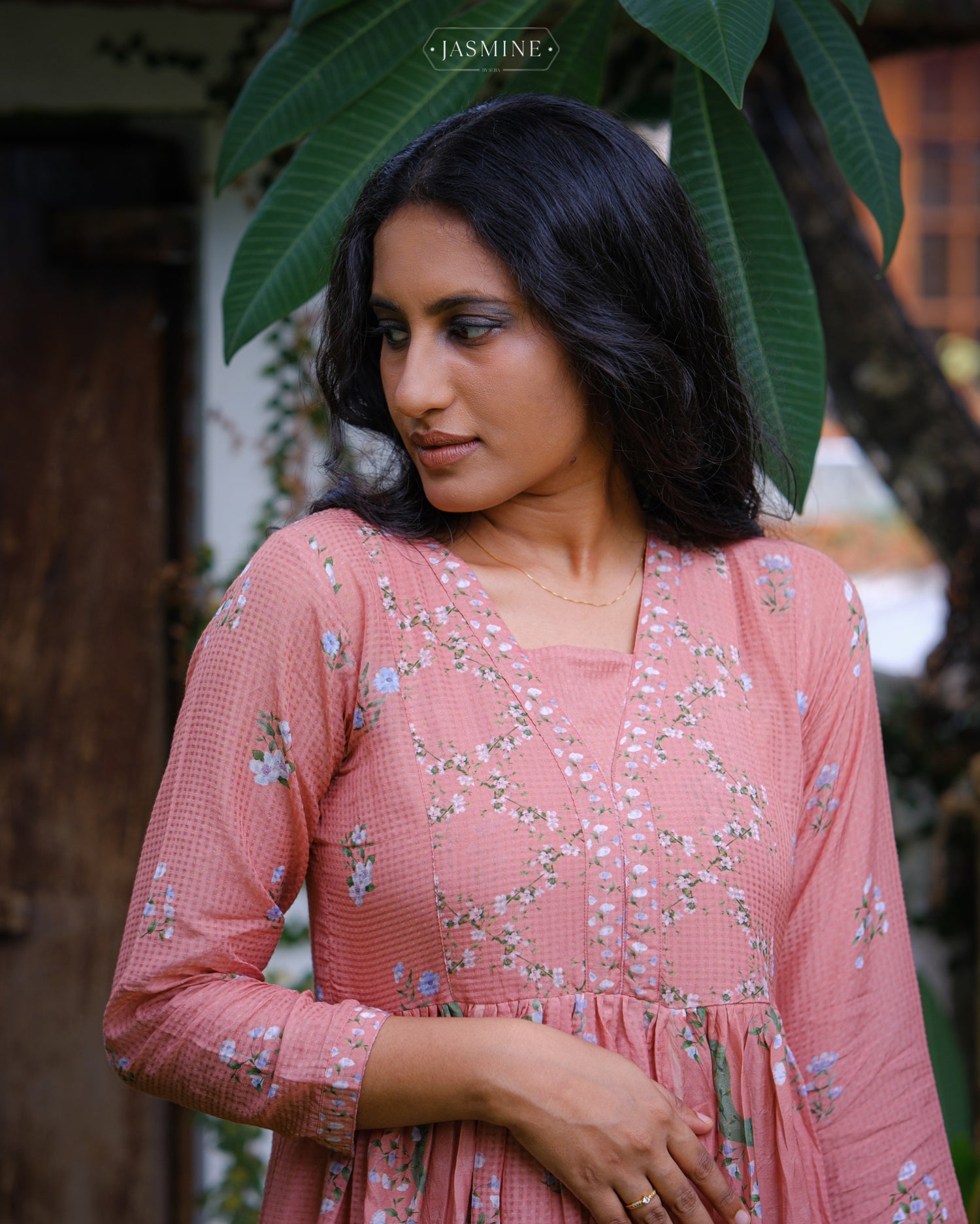 In-house printed Jasmine prints on coral shaded pleated kurta set in viscose voile