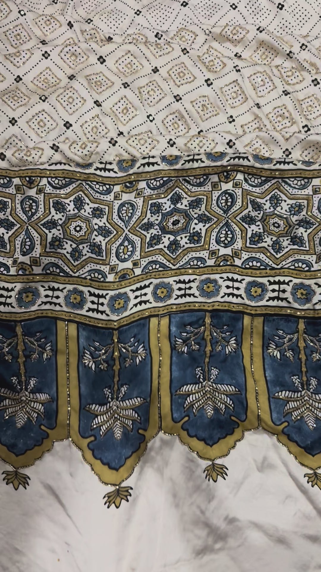 Ajrakh pure modal silk hand dyed, hand block printed and handworked saree