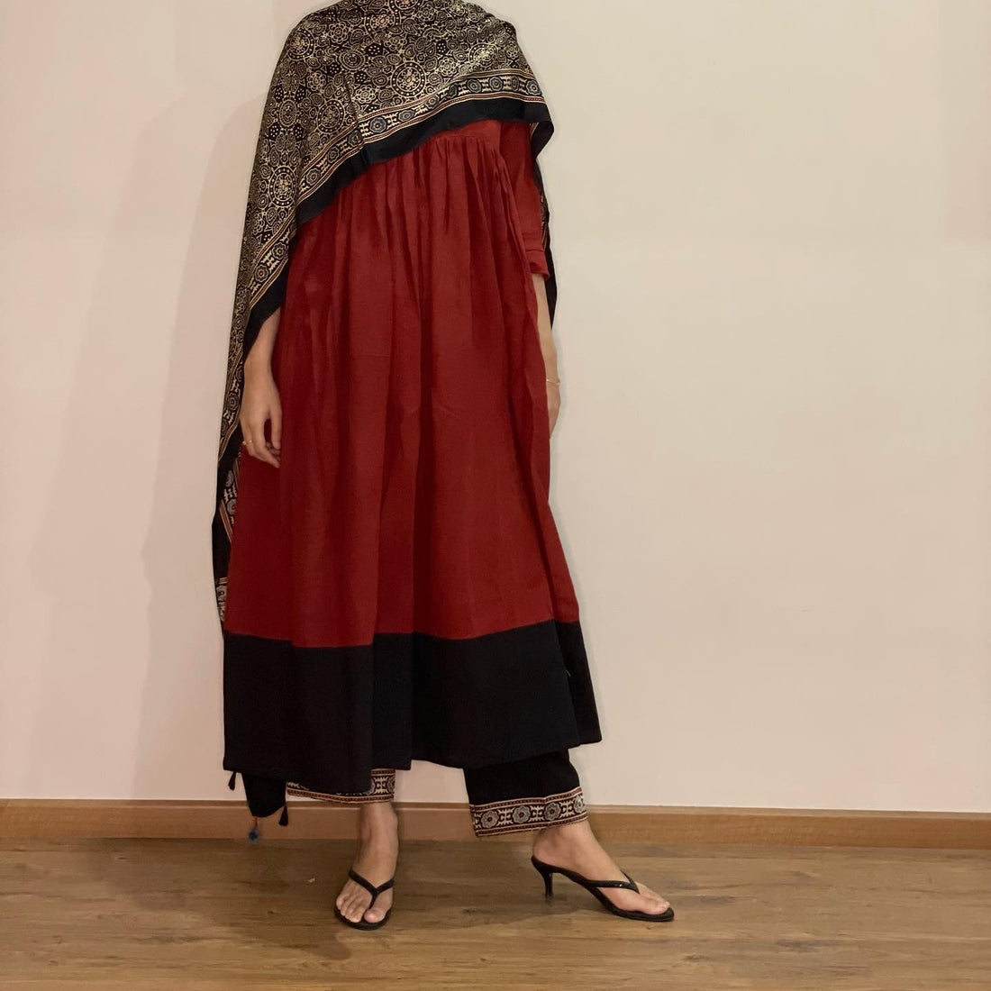 Ajrakh cotton pleated top and pants with modal silk dupatta.