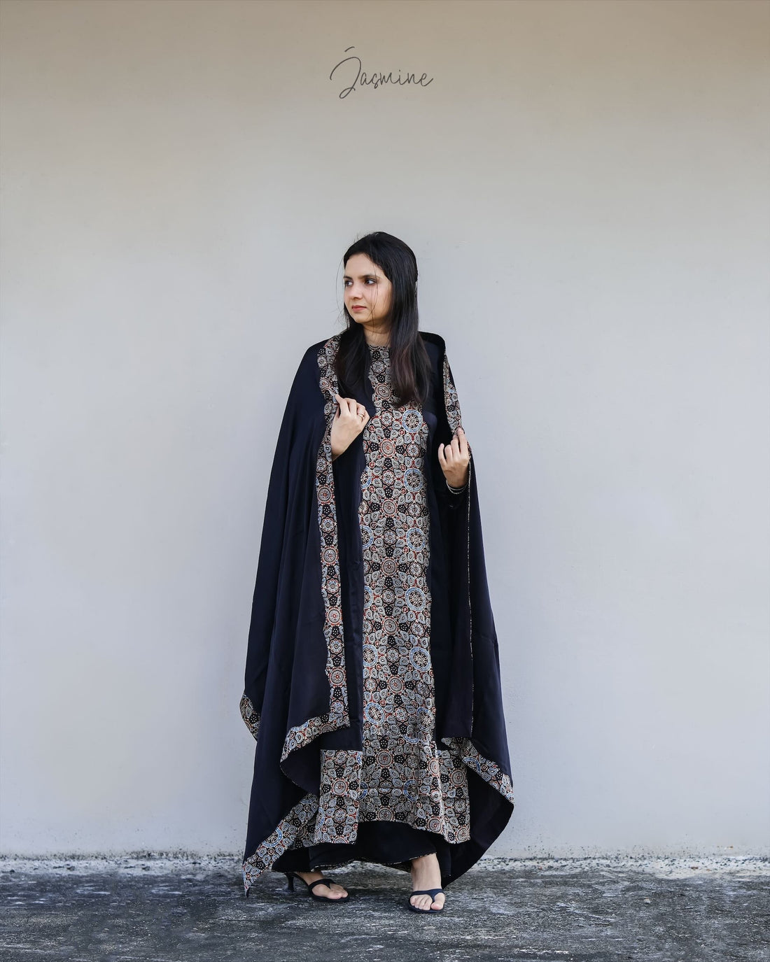 Ajrakh modal silk panel cut dress with printed modal silk patchwork teamed with
panel cut wide pants.